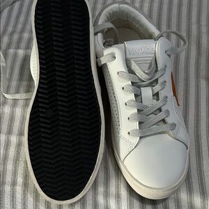 Vintage White Sneakers with Orange Accent